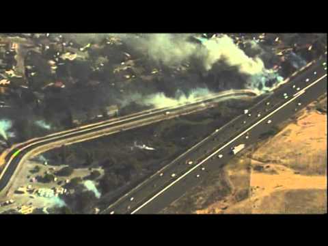 Raw: Fast-Moving Grass Fire Burns Calif. Homes