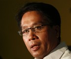 Sen. Mar Roxas, running mate of President-apparent Sen. Benigno "Noynoy" Aquino III, talks to the media following the meeting of Aquino and the new U.S. Ambassador to the Philippines Harry Thomas Jr., at Aquino III's residence at Manila's Quezon city Friday May 21, 2010. Thomas, who congratulated the yet-to-be proclaimed Aquino III, became the first foreign diplomat to meet with Aquino. (AP Photo/Bullit Marquez)