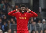 Liverpool's Daniel Sturridge celebrates his third goal against Fulham during their English Premier League soccer match at Craven Cottage, London, Sunday, May 12, 2013.