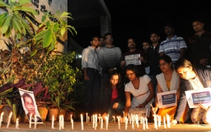 IIMB students observing the candle light vigil and took pledge of Integrity to pay homage to...