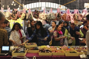 Visitors check out hair bands at a Thailand stall during the India International Trade Fair...