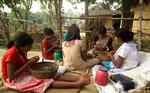 Group of  Girls making "Beri" ( Cigarettes Local Language in Bengal ) during the excursion for the children in observance of World Day Against Child Labour at Kolkata in Eastern India City