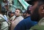 Pakistan's former President and military ruler Pervez Musharraf, center, arrives in an anti-terrorism court in Islamabad, Pakistan on Saturday, April 20, 2013.