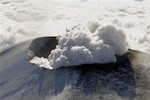 Smoke billows from a crater of Mt.Asama, central Japan early Monday, Feb. 2, 2009. The mountain spewed volcanic smoke earlier this morning. The country's Meteorological Agency warned Sunday that the volcano was in danger in erupting after detecting an increase in seismic activity