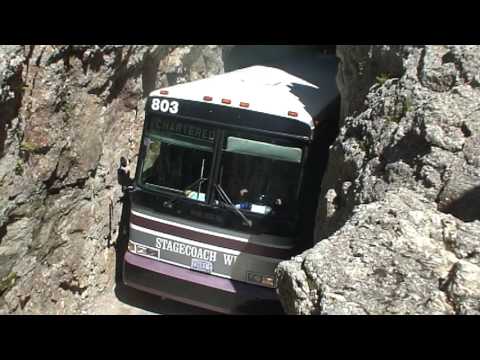 Charter Bus in Rock Tunnel