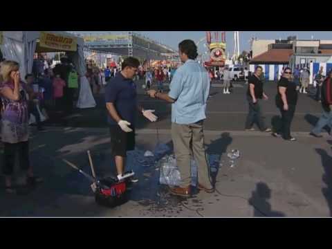 TV Reporter ruins ice sculpture