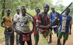 File - In this photo taken Tuesday, Nov. 26, 2013, fighters from a Christian militia movement known as the "anti-balaka" display their makeshift weaponry in the village of Boubou, halfway between the towns of Bossangoa and Bouca, in the Central African Republic.