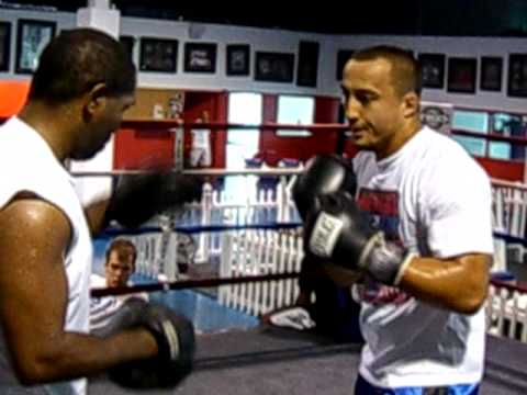 Denis Kang doing pads with Howard Davis Jr