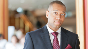 A business student in a suit