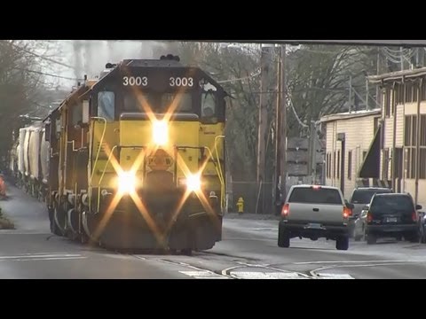 (HD) P&W Freight Train running down the Street