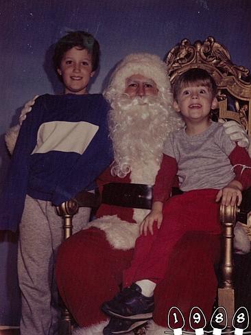 1988 ... Standing or sitting, the brothers loved being with Santa. Picture: Martin Gray 