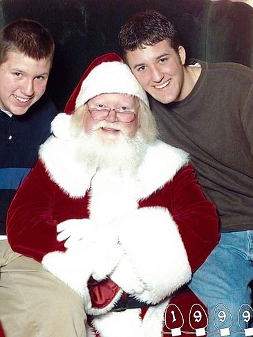 1999 ... Just squeezing in to the photo with Santa now. Picture: Martin Gray 