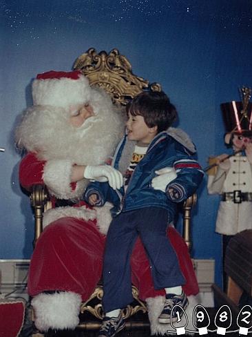 1982 ... Mike sits with Santa around the age of three. Picture: Martin Gray 