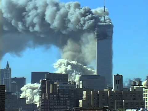 ‪September 11, 2001‬ attack - the towers fall. Twin Towers drop.