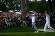 Adam Scott and caddie Steve Williams celebrate after Scott made a birdie putt on the second sudden death playoff hole to defeat Angel Cabrera to win the 2013 US Masters.