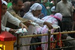 Kashmiri pandits offering prayers at Kheer Bhawani Tample on the occasion of annual Mela at Tulmula in Ganderbal District of West Kashmir on Saturday 19 HJune 2010.