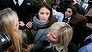 ISLEWORTH, ENGLAND - DECEMBER 20: Elisabetta Grillo (C) and Francesca Grillo (head down, to right) leave Isleworth Crown Court on December 20, 2013 in Isleworth, England. The Italian sisters, who worked as assistants to Nigella Lawson and Charles Saatchi, were mobbed by media as they left the court after being found not guilty of defrauding their former employers of over 300,000 GBP. (Photo by Dan Dennison/Getty Images)