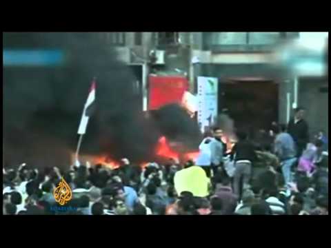 The bombing set off a riot in Mansoura on Tuesday afternoon, with hundreds of people attacking a business establishment and setting on fire two vans reportedly owned by the Muslim Brotherhood, according to Al Jazeera\'s Mahmoud Sobky, who is reporting from Mansoura.