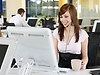 woman in office with headset