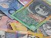 Man charged after $90k cash find