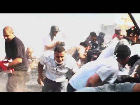 Egyptian military fires at protesters