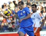 Kuruvchi's Brazilian player Rivaldo, left, and Saipa's Omid Sharifinasab fight for the ball during an AFC Champions League quarterfinal soccer match between Kuruvchi, Uzbekistan, and Saipa, Iran, in Tashkent, Uzbekistan, Wednesday, Sept. 24, 2008. Kuruvchi won with the score 5-1.