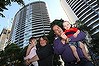 Matthew and Roxanne Stedman at their Chatswood high rise apartment with their two kids Mia 2 and Callum 9 mnths