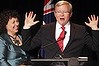 Former Australian Prime Minister Kevin Rudd speaks as his wife Therese Rein listens at a Labor Party function in Brisbane.