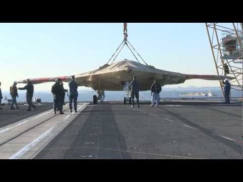 X-47B Loaded Onto USS Harry S. Truman (CVN-75)