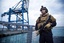 In this photo provided by Norwegian Armed Forces and taken Saturday, Dec. 28, 2013, a security forces member stands guard aboard the Norwegian frigate Helge Ingstad, in Limassol, Cyprus.