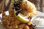 Local beer-battered flathead and chips at the Boathouse Palm Beach.