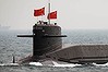 A Chinese submarine is seen as part of the celebrations for the 60th anniversary of the founding of the People's Liberation Army Navy, off Qingdao, China, on Thursday, April 23, 2009.  Fifty-six Chinese subs, destroyers, frigates and missile boats took part in the celebration display. Photographer: Guang Niu/Pool via Bloomberg News