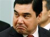 Turkmenistan's President Gurbanguli Berdymukhamedov grimaces during a meeting with Russian Prime Minister Vladimir Putin in Moscow, Russia, Wednesday, March 25, 2009.