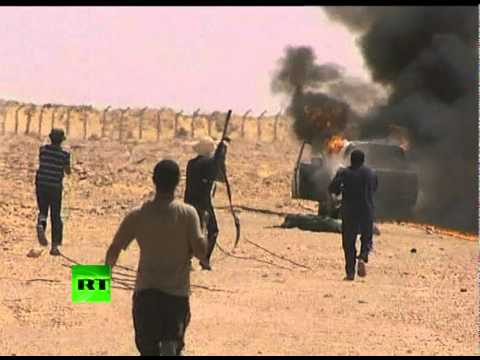 Dramatic video shows Libya rebels fighting 'Gaddafi loyalists'