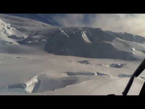 Antarctica, helicopter flight over Peter I Island.