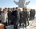 File - In this undated photo released by the Korean Central News Agency (KCNA) and distributed Thursday, March 14, 2013, by the Korea News Service, North Korean leader Kim Jong Un watches a live ammunition firing drill.