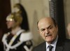 Center-left leader Pier Luigi Bersani speaks to the media, at Rome's Quirinale presidential palace, Friday, March 22, 2013.