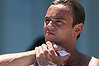 BARCELONA, SPAIN - JULY 28:  Tom Daley of Great Britain stretches his arm during the Men's 10m Platform Diving final on day nine of the 15th FINA World Championships at Piscina Municipal de Montjuic on July 28, 2013 in Barcelona, Spain.  (Photo by Clive Rose/Getty Images)