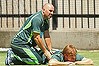 Australian physiotherapist Alex Kountouris works on Shane Watson's back before the Boxing Day Test.