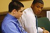 Trent Mays (L) and Ma'lik Richmond (R) sit in juvenile court in Steubenville, Ohio, March 15, 2013. One of two high school football players in Ohio accused of raping a girl at a party last summer had pictures of the teen on his cell phone from that night, a state forensic analyst testified on Thursday. REUTERS/Keith Srakocic/Pool  (UNITED STATES - Tags: CRIME LAW EDUCATION SPORT SOCIETY)