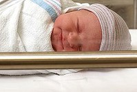 Newborn babies sleeping in hospital nursery