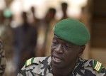 Coup leader Capt. Amadou Haya Sanogo addresses the press at junta headquarters in Kati, outside Bamako, Mali Friday, March 30, 2012.