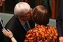 Kevin Rudd kisses Nicola Roxon after she delivered her valedictory at Parliament House in Canberra on Tuesday 18 June 2013. Photo: Andrew Meares