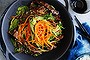 Bibimbap with beef and onions.