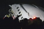 In this picture released by the Mehr news agency, wreckage of the IranAir Boeing 727 passenger plane is seen, which crashed after it was making an emergency landing, outside the city of Orumiyeh, 460 miles (700 kilometers) northwest of the capital, Tehran, Iran, Sunday, Jan. 9, 2011. An IranAir passenger jet carrying 106 people crashed as it was making an emergency landing Sunday in a snowstorm in the country's northwest and broke into several pieces, killing more than 70 of those on board, Iranian media reported. The others survived with light injuries.