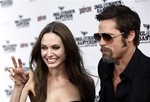 Cast member Brad Pitt, right, and Angelina Jolie arrive at the premiere of "Inglourious Basterds" in Los Angeles on Monday, Aug. 10, 2009.