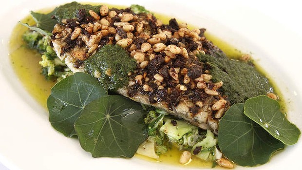 Elevating: Olive and pine nuts top grilled sea bream.