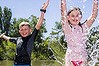 Roman (7) and Teah (9) Smith from Duffy cool off in the Lake at Western Park.