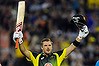 Aaron Finch celebrates his ton on Sunday.