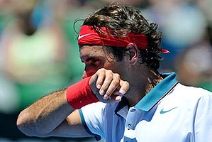 Roger Federer feels the heat during his first-round match against James Duckworth.